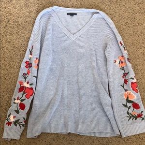 American Eagle sweater with floral sleeves